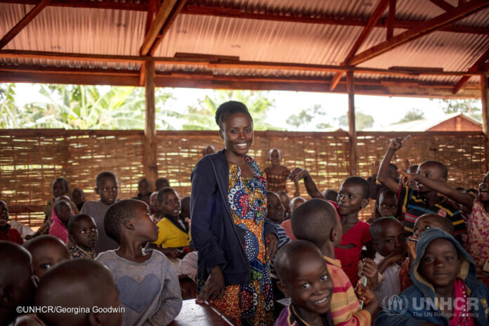 Tanzania. Burundian schoolkids and teachers desperate for learning resources