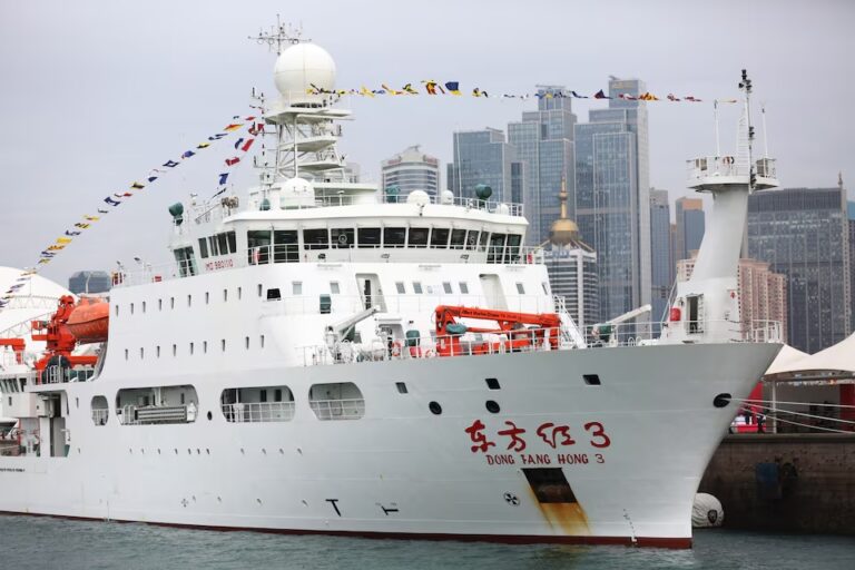 The Dong Fang Hong 3 docked in Qingdao, Shandong province. The research ship, whose name translates to "The East is Red," spent 2024 and 2025 moving back and forth in the seas near Taiwan and Guam, and around strategic stretches of the Indian Ocean, ship-tracking data shows. Cnsphoto via REUTERS